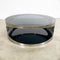 Modernist Coffee Table With Stainless Steel Base And Smokey Glass Top