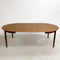 Mid Century Danish Teak Round Dining Table With Two Extension Leafs