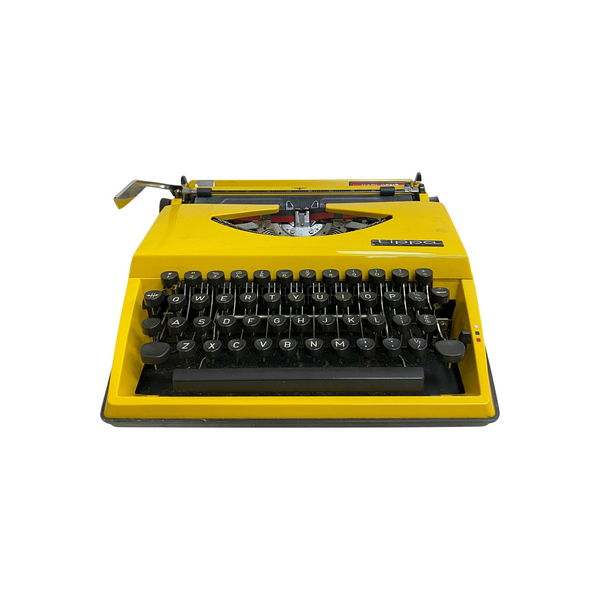 Vintage Yellow Triumph Tippa portable vintage retro typewriter