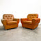 Pair of Orange Leather Rolled Armchairs