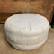 cream leather ottoman