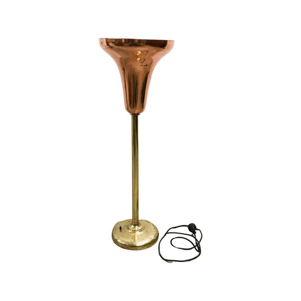 Copper floor lamp on a white background