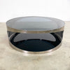 Modernist Coffee Table With Stainless Steel Base And Smokey Glass Top