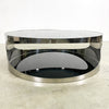 Modernist Coffee Table With Stainless Steel Base And Smokey Glass Top