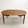 Mid Century Danish Teak Round Dining Table With Two Extension Leafs