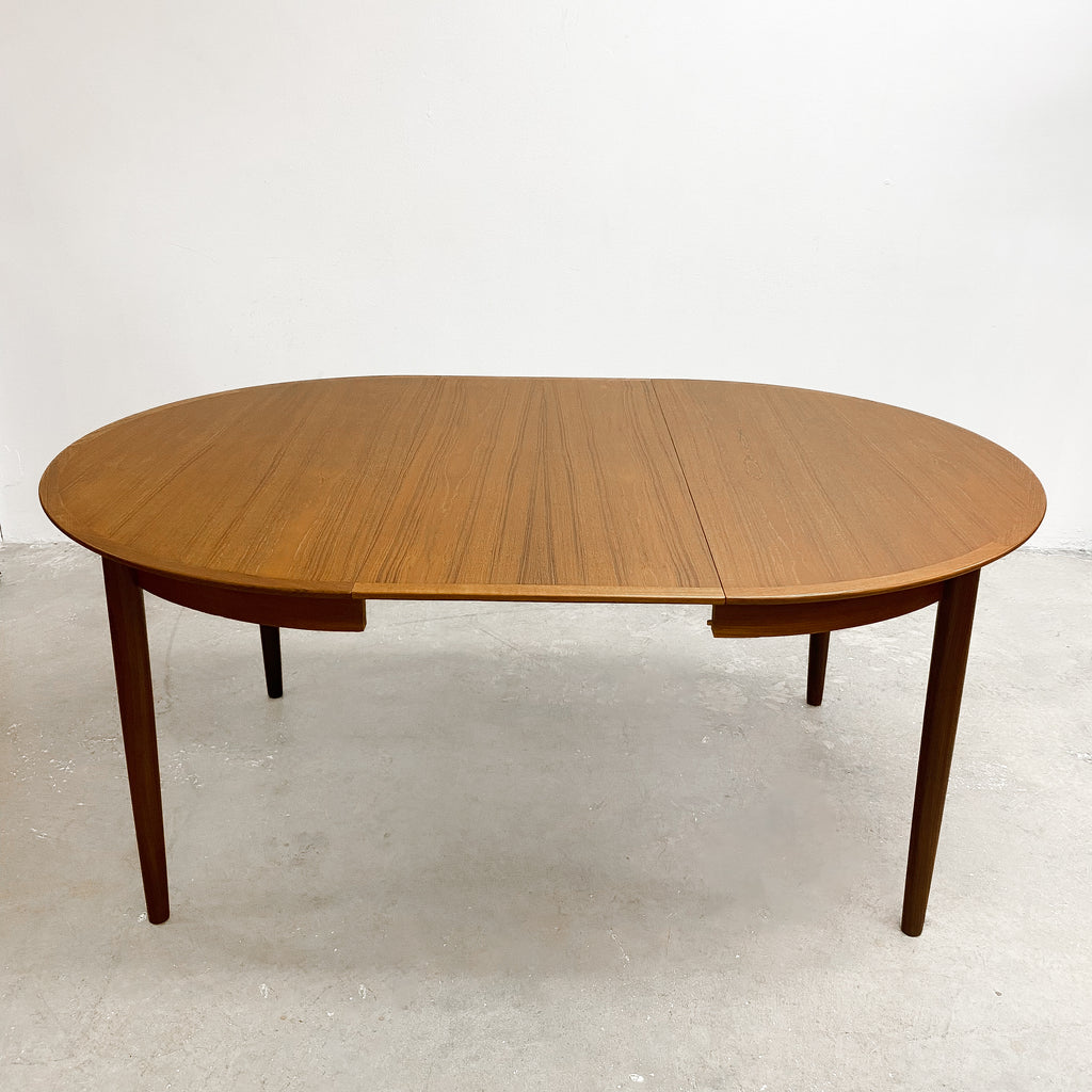 Mid Century Danish Teak Round Dining Table With Two Extension Leafs