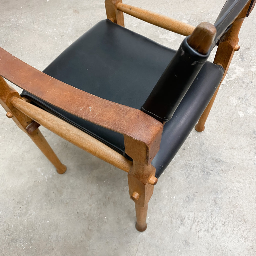 Designed by renowned furniture designer Michael Hirst, this chair drawn inspiration from classic safari aesthetics.