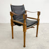 Designed by renowned furniture designer Michael Hirst, this chair drawn inspiration from classic safari aesthetics.