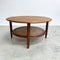 Stunning mid century TH Brown round coffee table. Made form Tasmanian Blackwood and featuring a rattan under shelf.