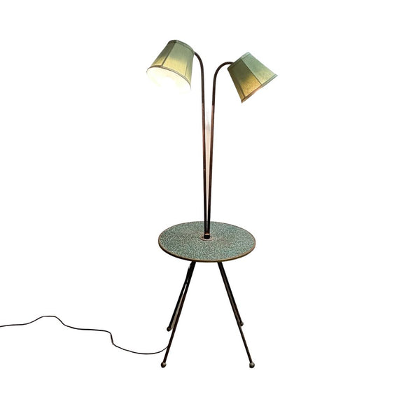 Floor lamp with a round table and two lampshades on a white background
