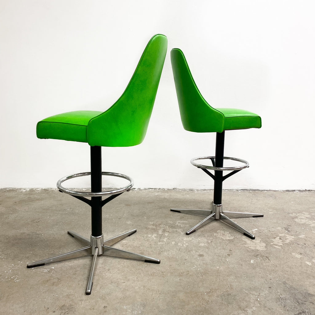 Pair Of Mid Century Green Vinyl Bar Stools