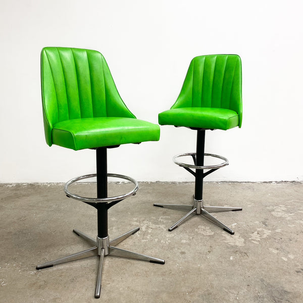 Pair Of Mid Century Green Vinyl Bar Stools