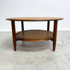 Stunning mid century TH Brown round coffee table. Made form Tasmanian Blackwood and featuring a rattan under shelf.