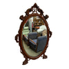 Ornately Carved 20th Century Oval Bevel Edge Mirror