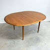 th brown mid century dining table