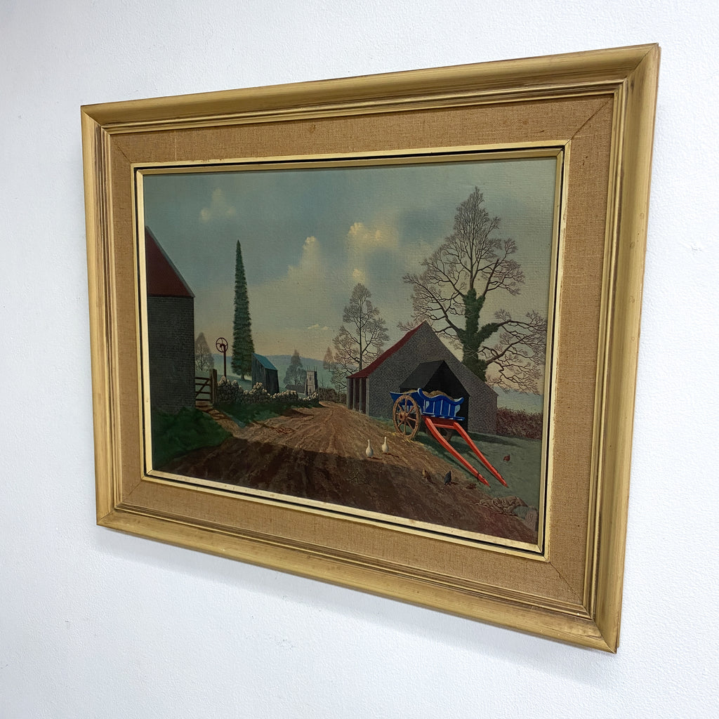 Framed painting of a rural landscape with a cart and trees on a white background