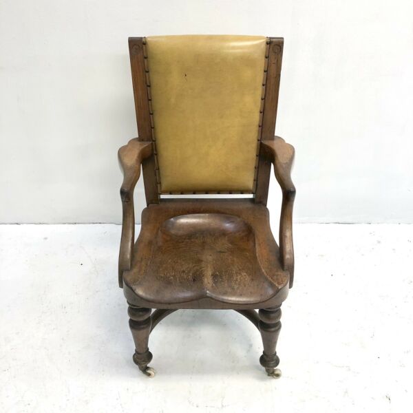 Antique Arts And Crafts carved Oak Armchair