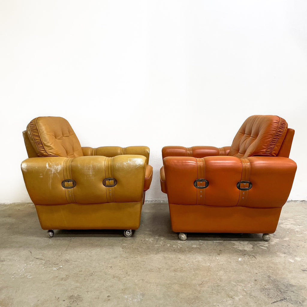 Pair of Orange Leather Rolled Armchairs