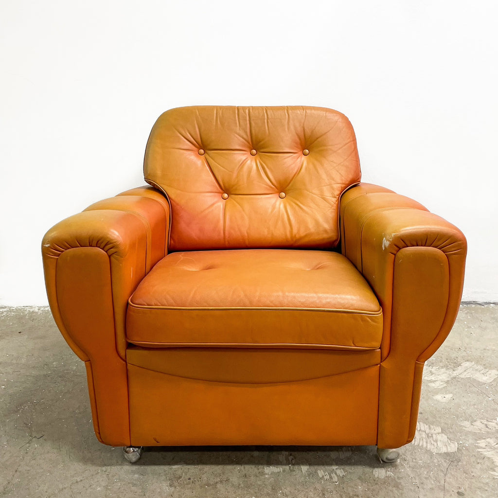 Pair of Orange Leather Rolled Armchairs