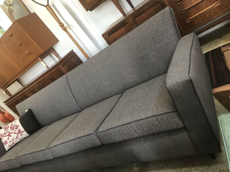 Newly Reupholstered mid century four seater lounge