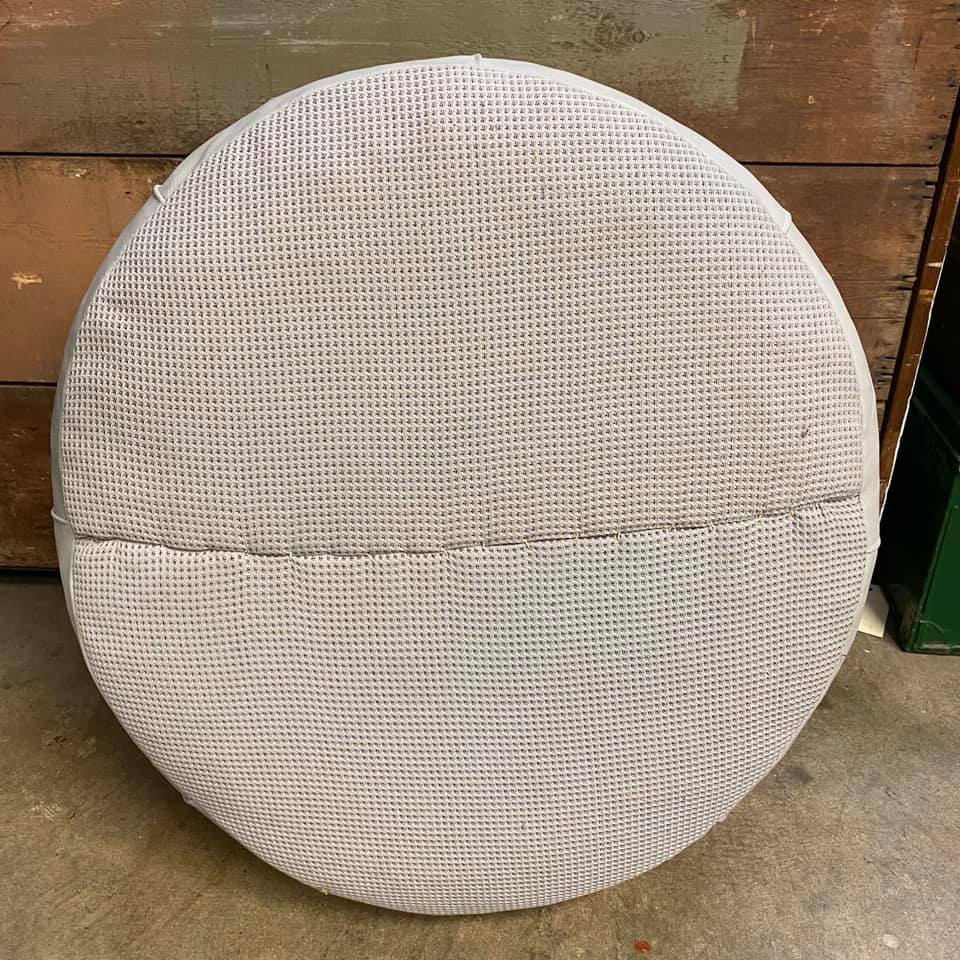 round leather ottoman